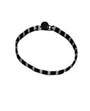Load image into Gallery viewer, Black and Clear Tila Beads Stackable Bracelet. Handmade beaded jewelry by Veronica of River Jewels
