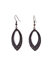 Load image into Gallery viewer, Warm gold catching the light. The feeling of sunshine held in an antique bronze frame. The Gilded Petal Filigree Earrings layer a shimmering gold polymer clay backing behind an intricate marquise-shaped filigree frame in antique bronze brass. The shimmer in the clay moves with you, catching light from every angle and creating a warm, luminous glow that feels both luxurious and effortless. Gold on bronze. Shimmer on lace. Day to evening without changing a thing. These are the earrings that make a simple outf
